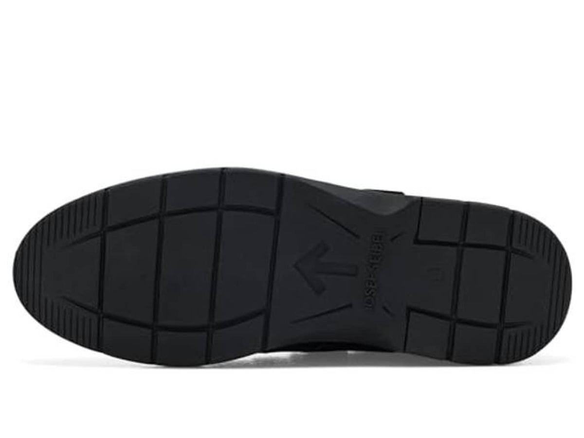 Black rubber outsole with tread pattern and brand text on the heel