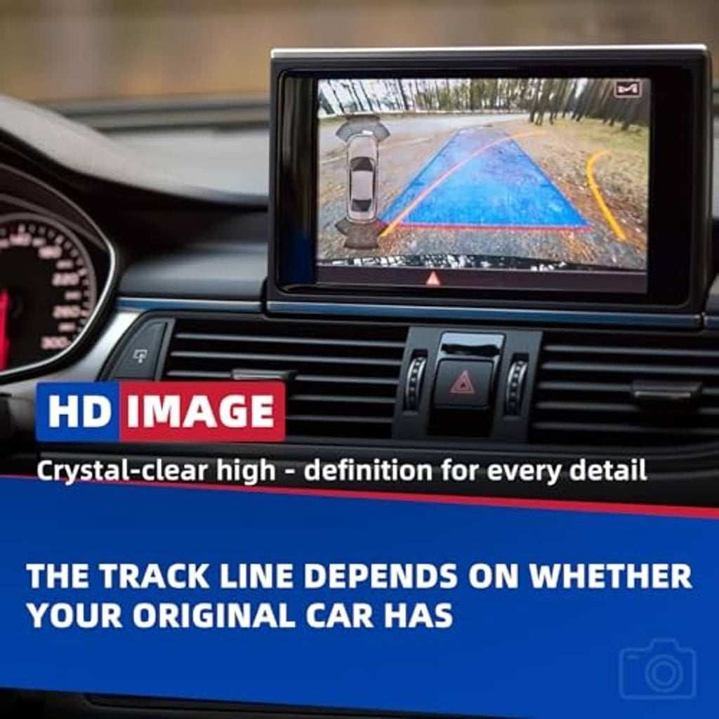 In-car backup camera monitor showing a parking area with guide lines
