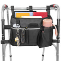 Black walker bag organizer with front zip pockets and cup holder attached to rail