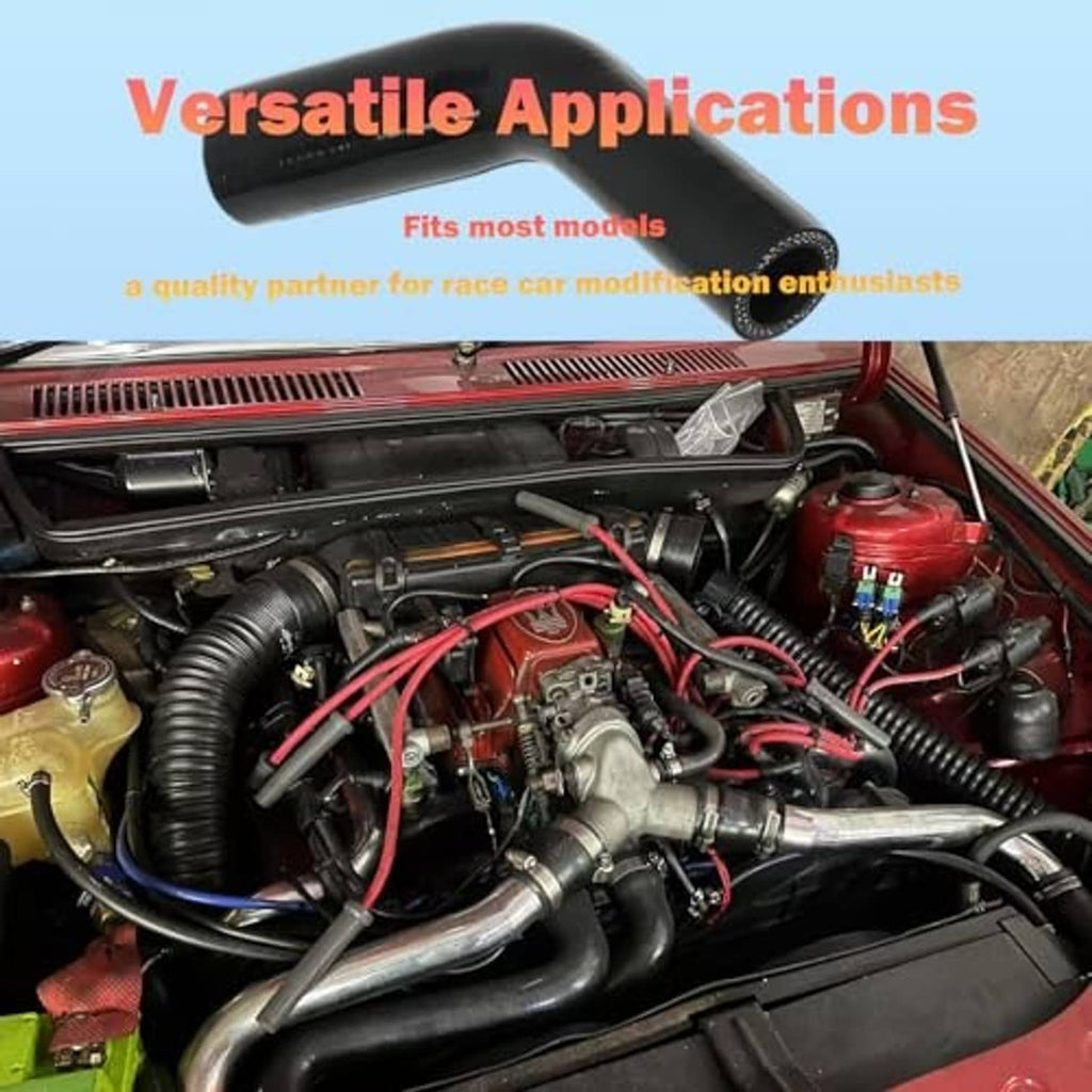 Black silicone elbow reducer hose installed in an engine compartment as a curved intake line