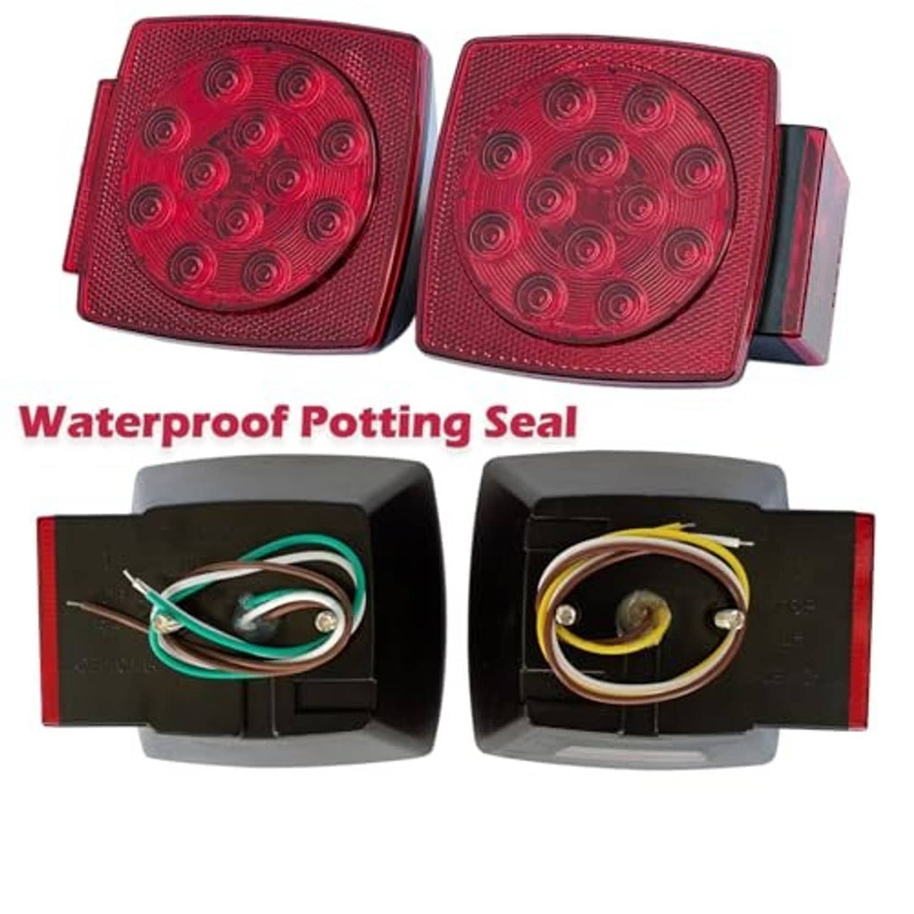 Red LED trailer marker lights, showing sealed wiring inside black housings