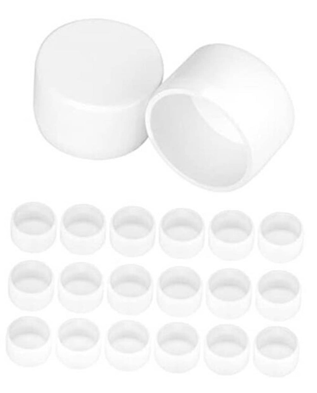 White 1-1/4 in PVC pipe end caps, two visible with additional caps below