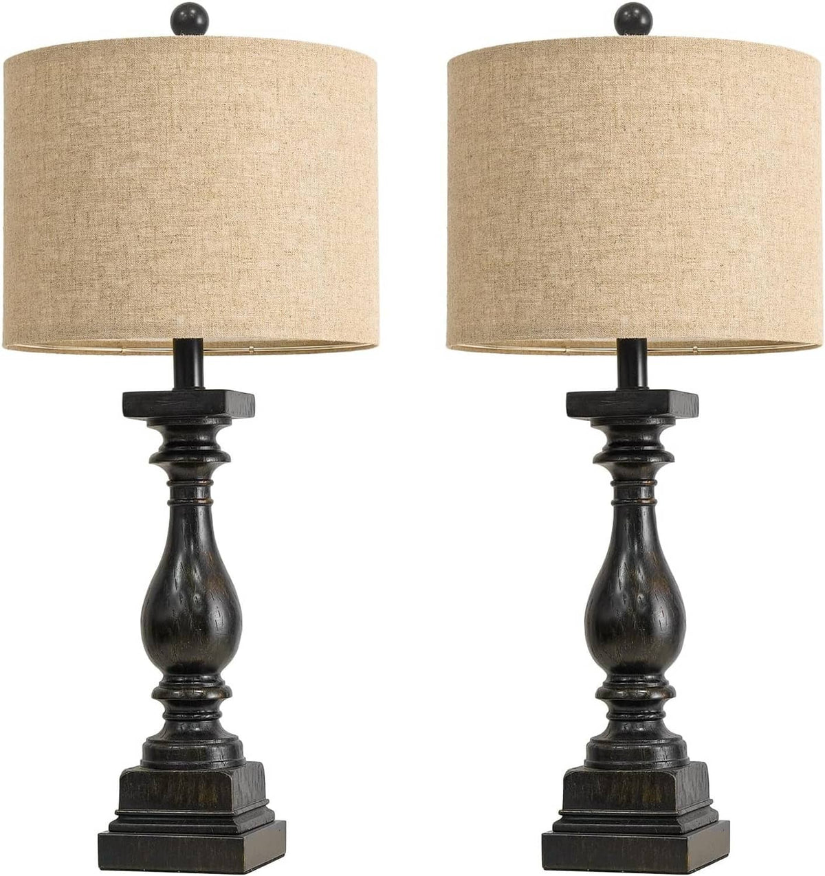 Pair of table lamps with beige drum shades and dark turned black pedestal bases