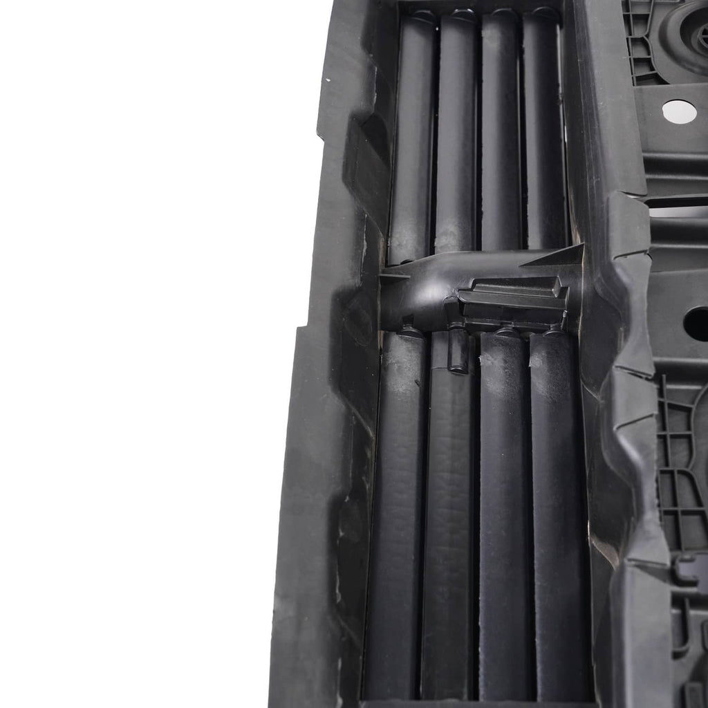 Close-up of black grille shutter slats inside the motor housing