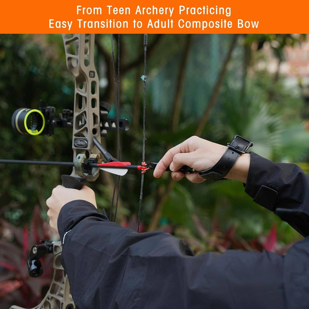 Wrist-mounted archery compound bow release aid on forearm during practice at the range.