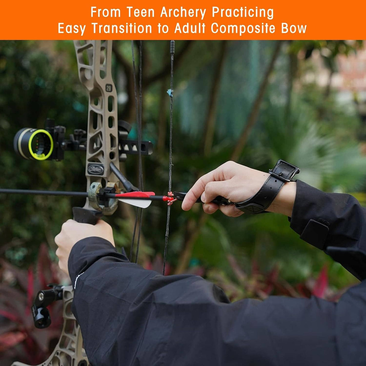 Wrist-mounted archery compound bow release aid on forearm during practice at the range.