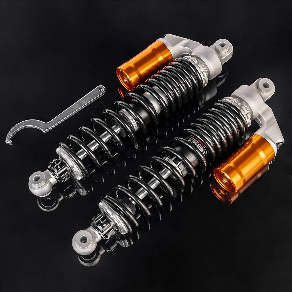 ATV front air shock absorbers with orange reservoirs, black springs, silver mounts