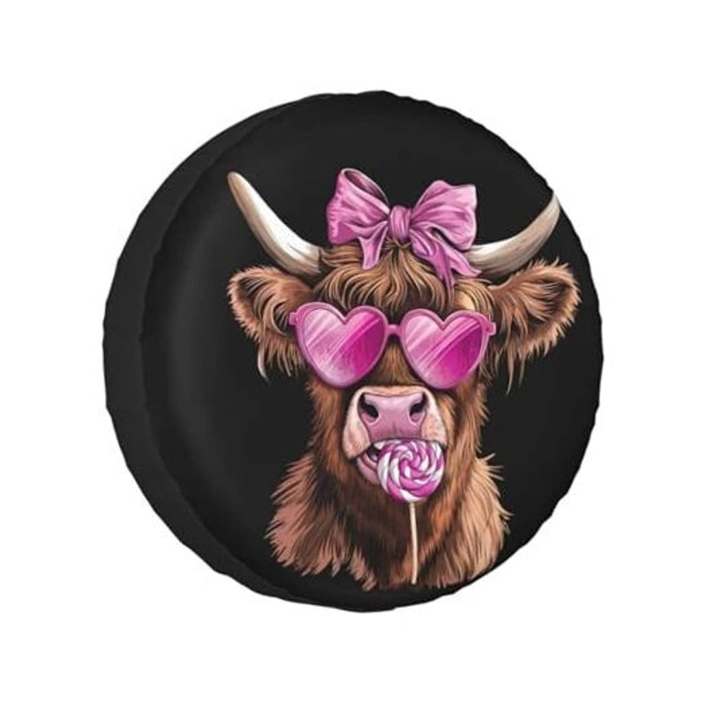 Round black spare tire cover with smiling Highland cow wearing pink bow and heart glasses