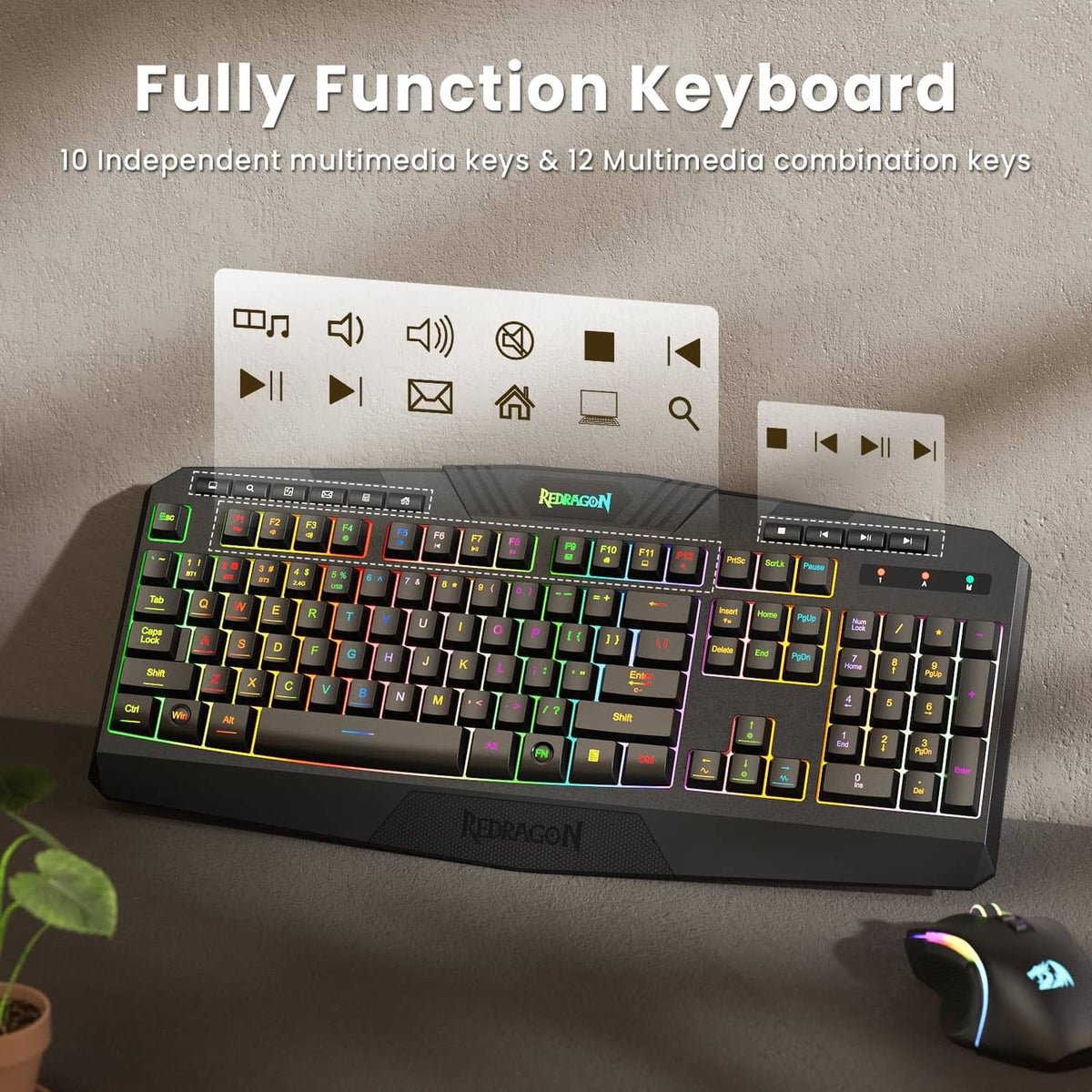 RGB backlit gaming keyboard, black with colorful keys and media control buttons