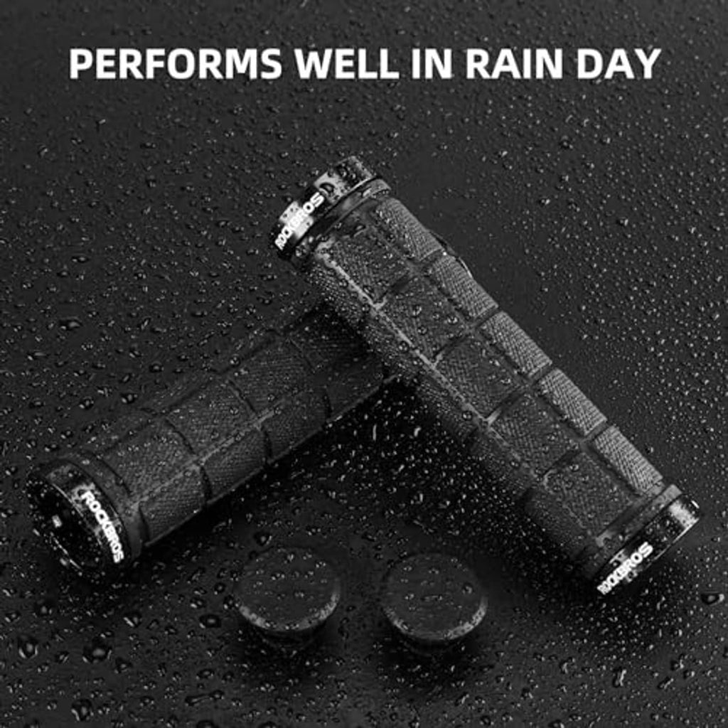 Black bike handlebar grips with raised texture, shown with water droplets