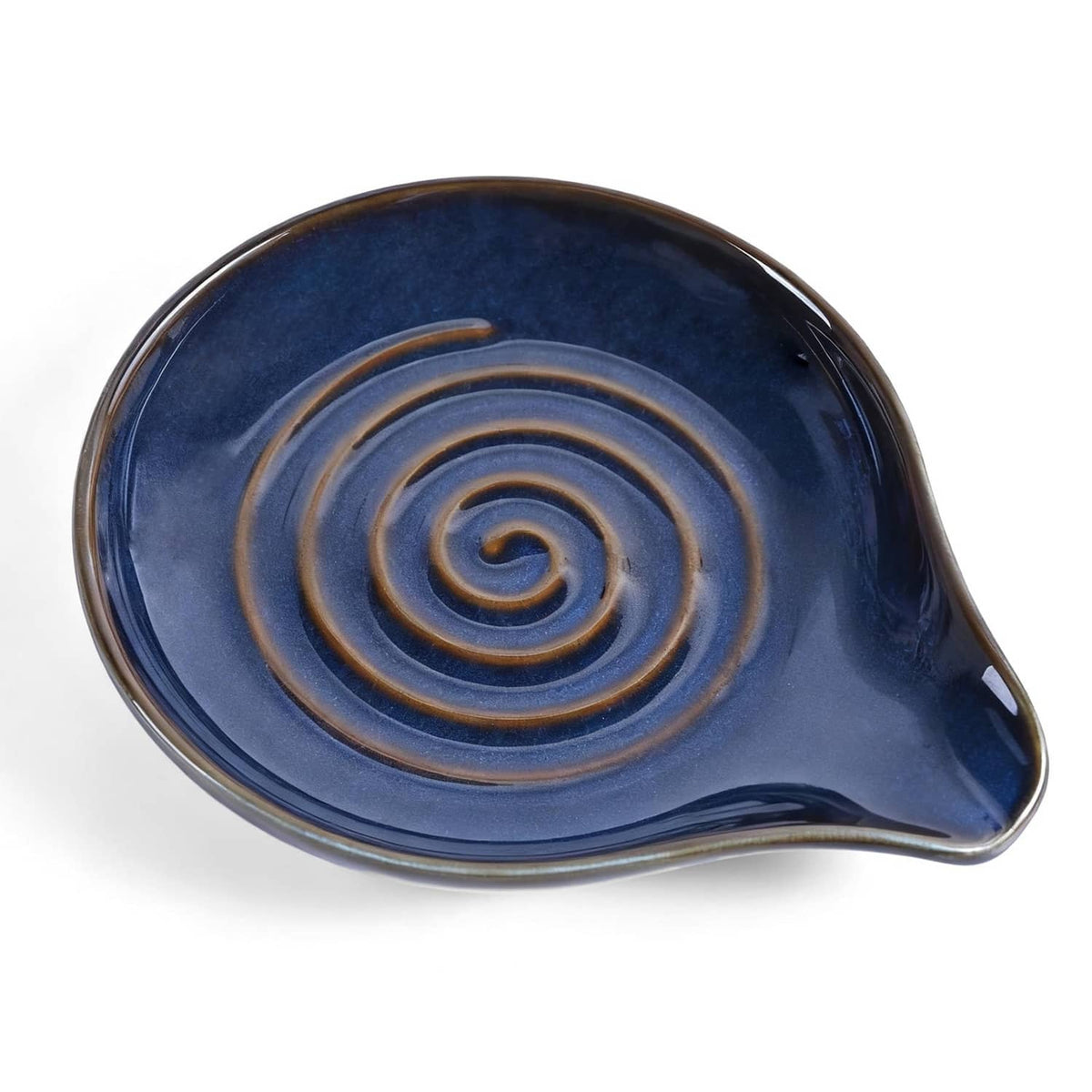 Dark blue ceramic spoon rest with spiral swirl pattern, rounded leaf shape