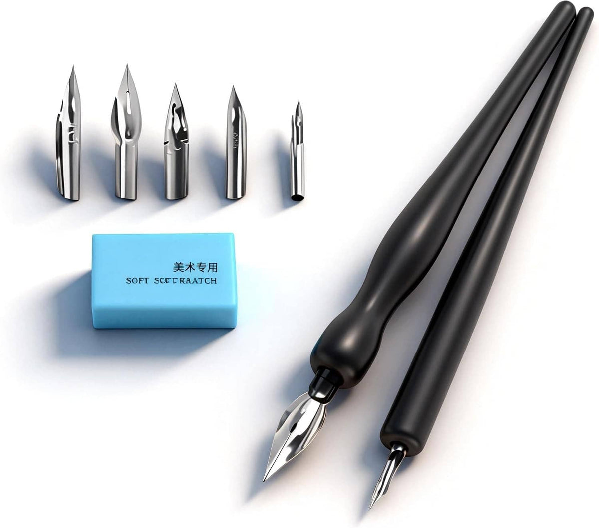 Two black dip pen holders with assorted steel nibs and a blue eraser block