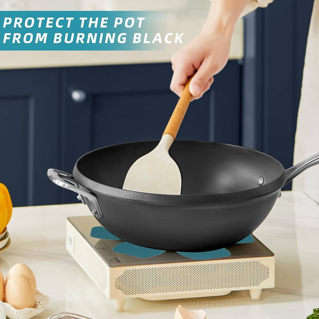 Teal felt pot protector pad under a black frying pan on a stovetop