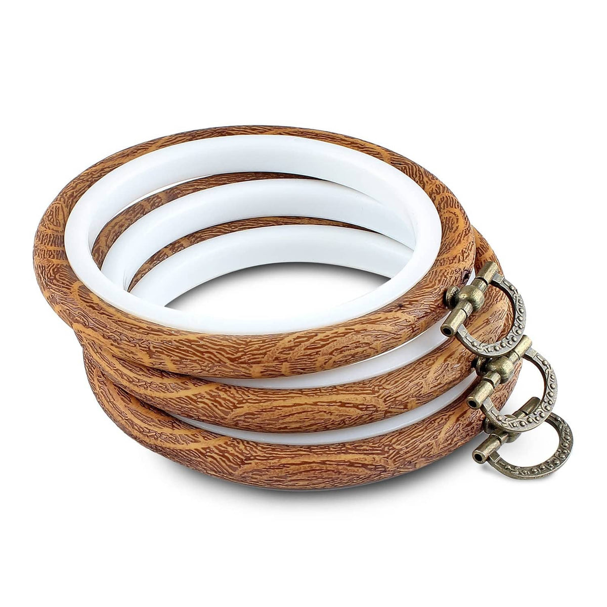 Curled embroidery hoop with brown faux wood frame, white inner rings, and metal clasp