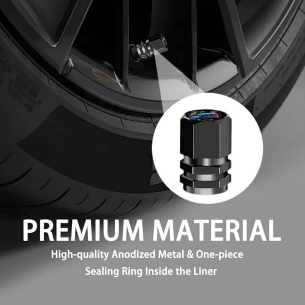 Black tire valve stem cap with silver inner ring, close-up on wheel