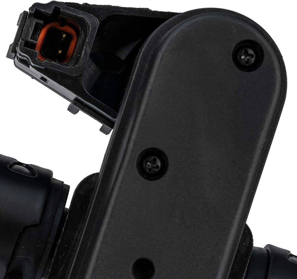 Close-up of heater control valve housing with electrical connector and mounting points