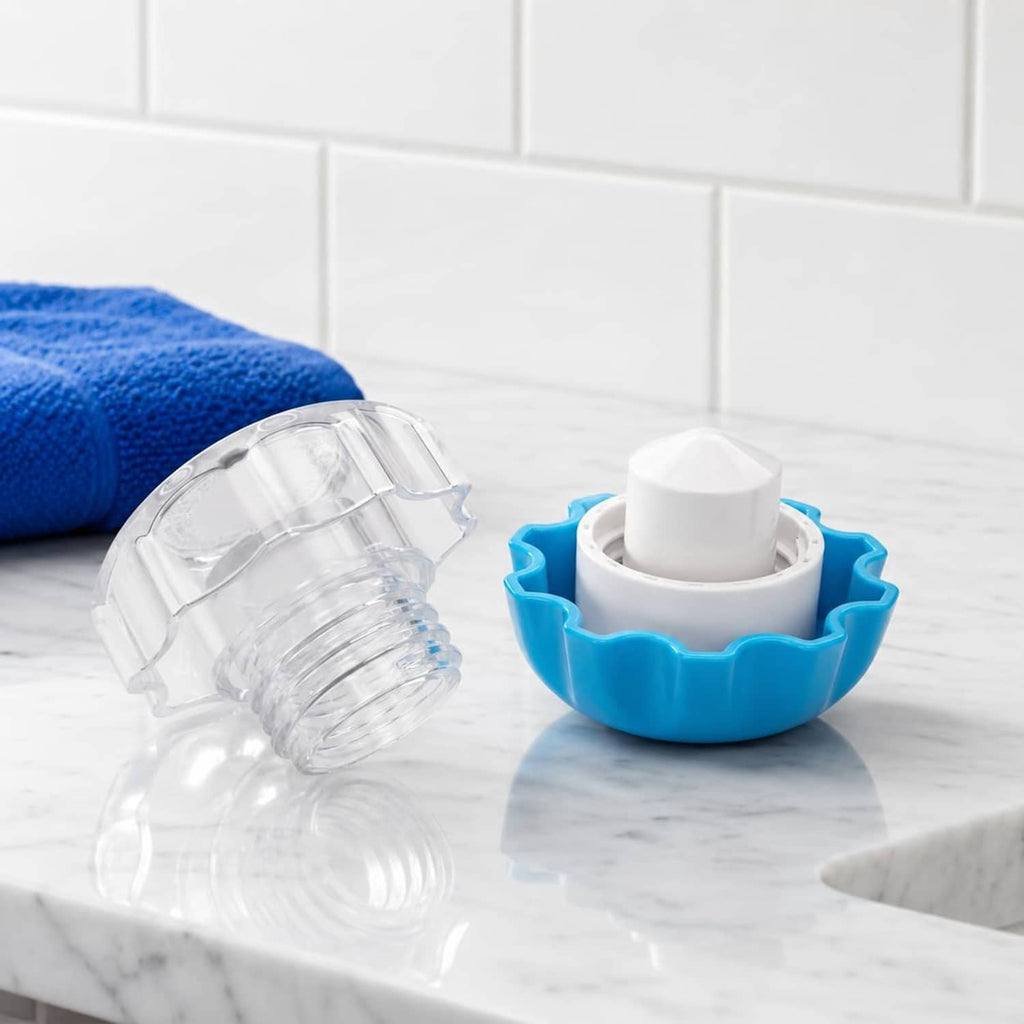 Pill crusher with clear chamber, blue base, and white cap