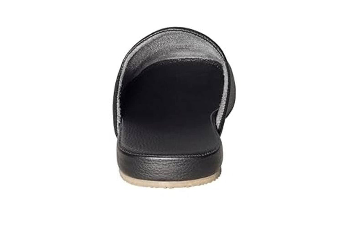Black leather slip-on slipper viewed from the back with cushioned heel