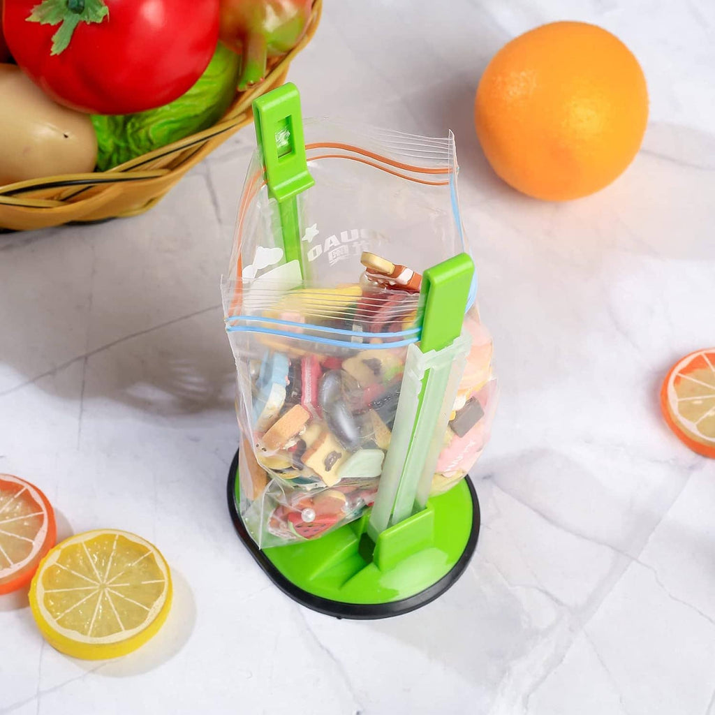 Green and clear freezer bag holder stand with clips, keeping a bag upright for storage