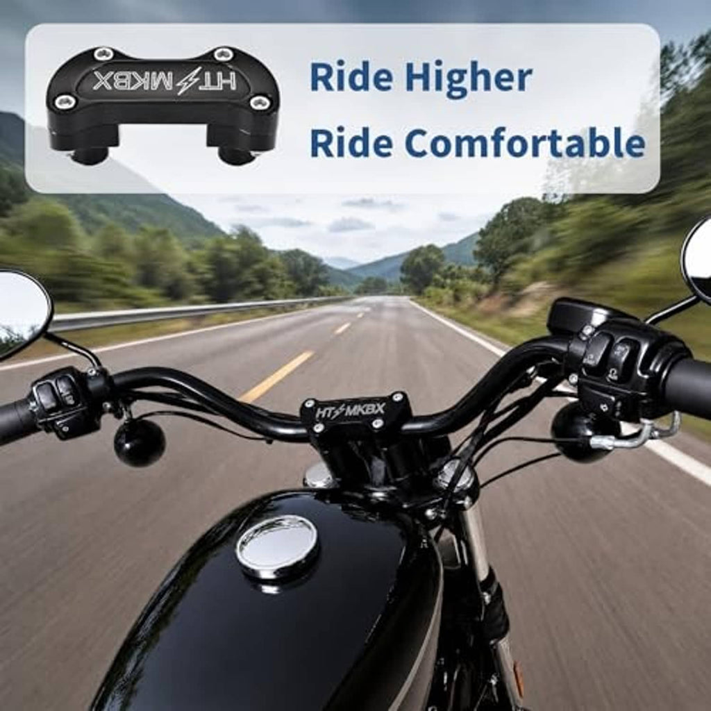 Black handlebar riser top clamp installed on motorcycle handlebar