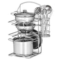 Child-size pretend cookware set: shiny metal pots, lids, and utensils in rack.