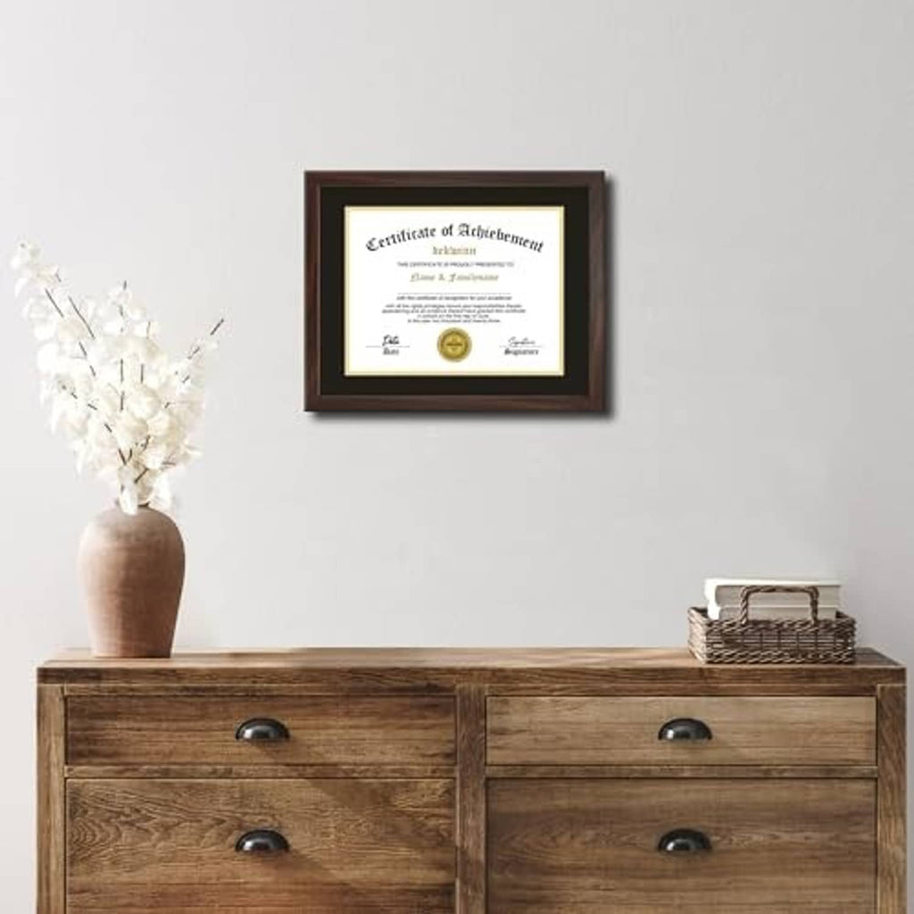 Walnut certificate frame with black mat and gold trim, wall-mounted