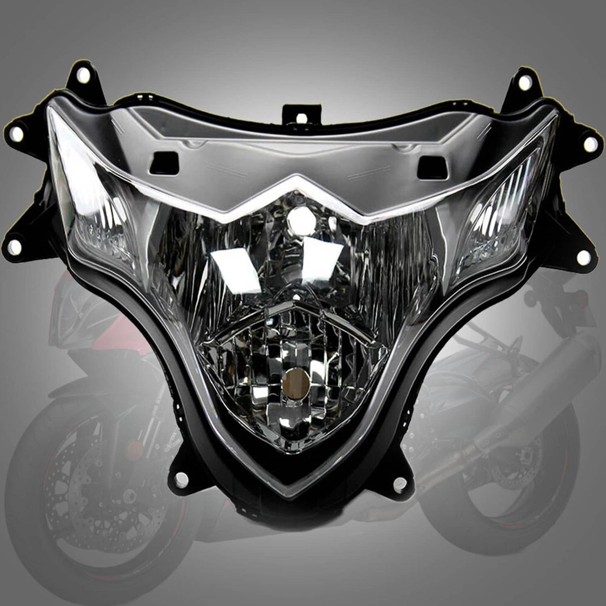 Motorcycle headlight assembly with clear lens, chrome reflector facets, black housing