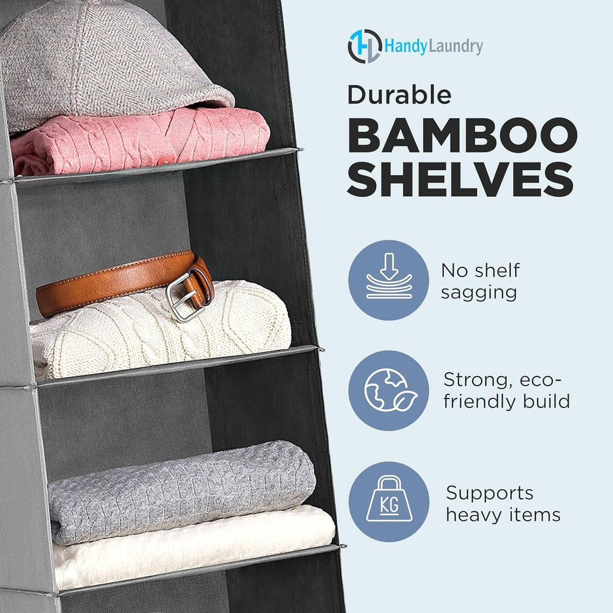 Close-up of gray hanging organizer shelves with folded clothes and a belt
