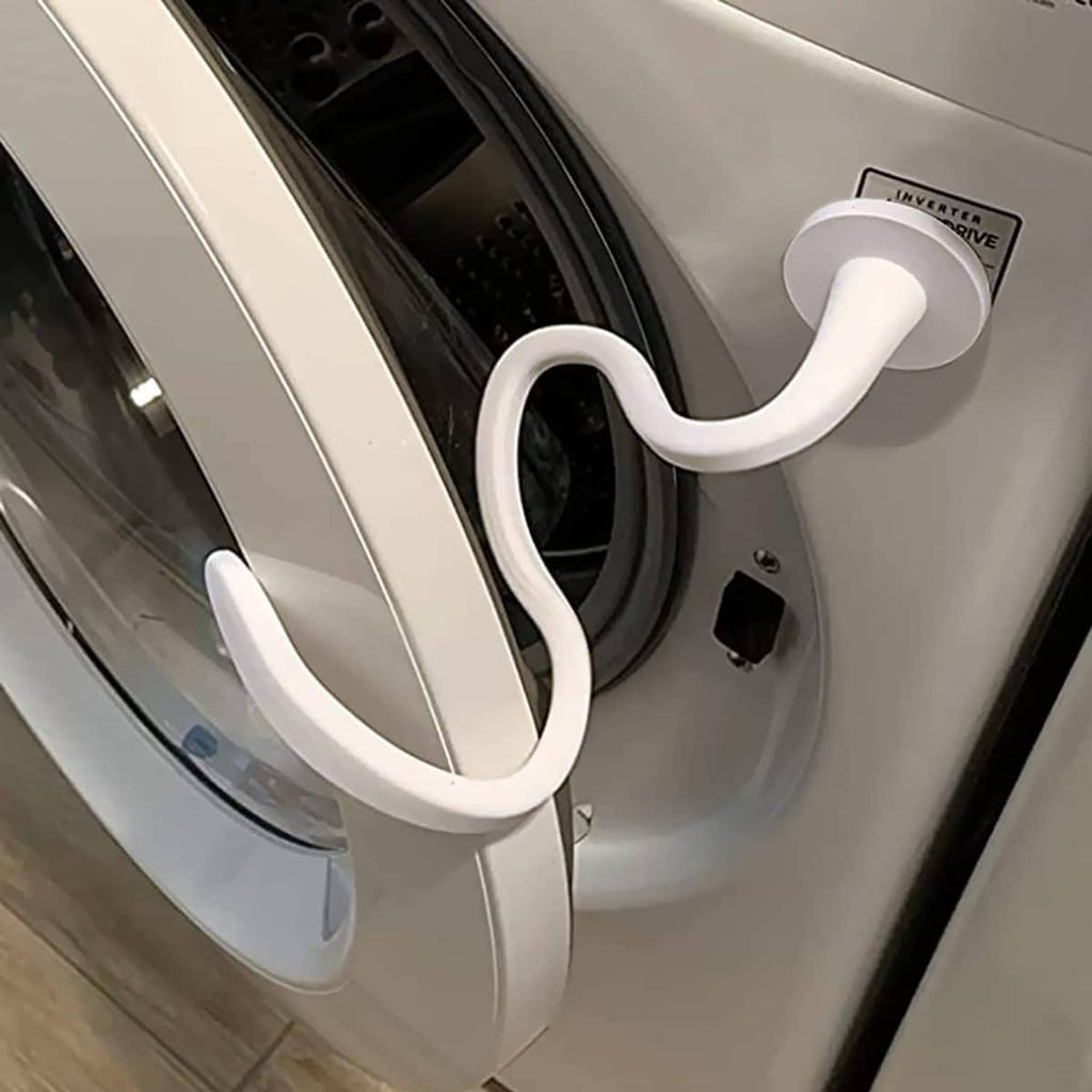 White magnetic washer door stopper arm resting against the front-loading door