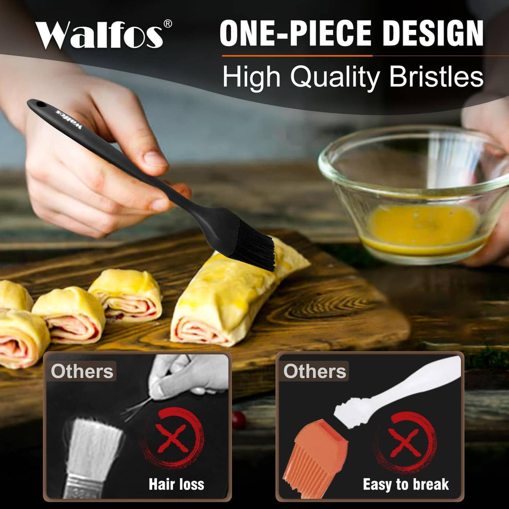 Black one-piece silicone pastry brush with ribbed head, held above dough