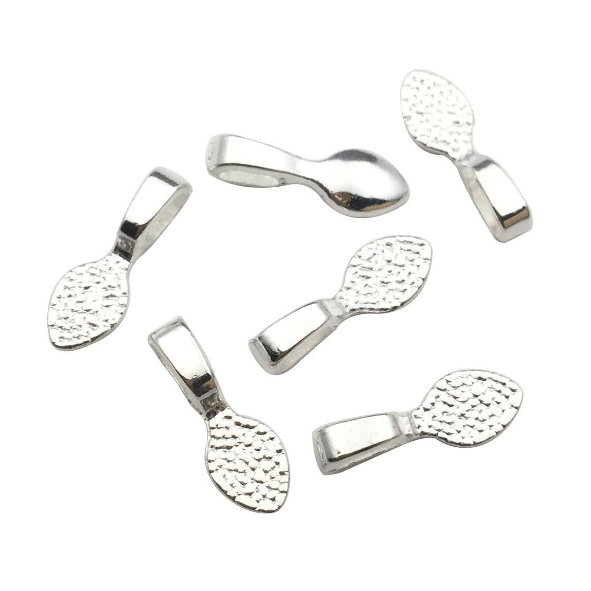 Shiny silver glue-on pendant bails with textured teardrop loop caps, angled view