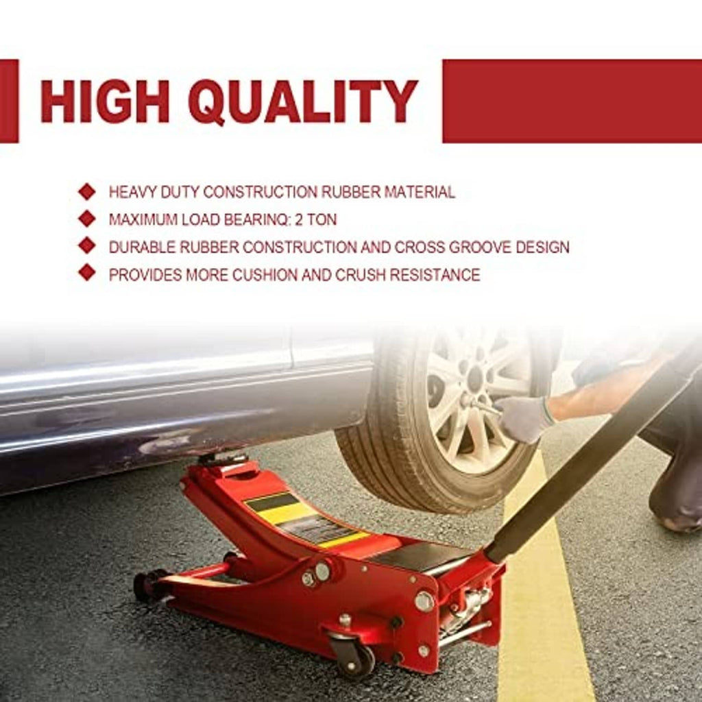 Black rubber jack pad on a red floor jack supporting a parked car tire.