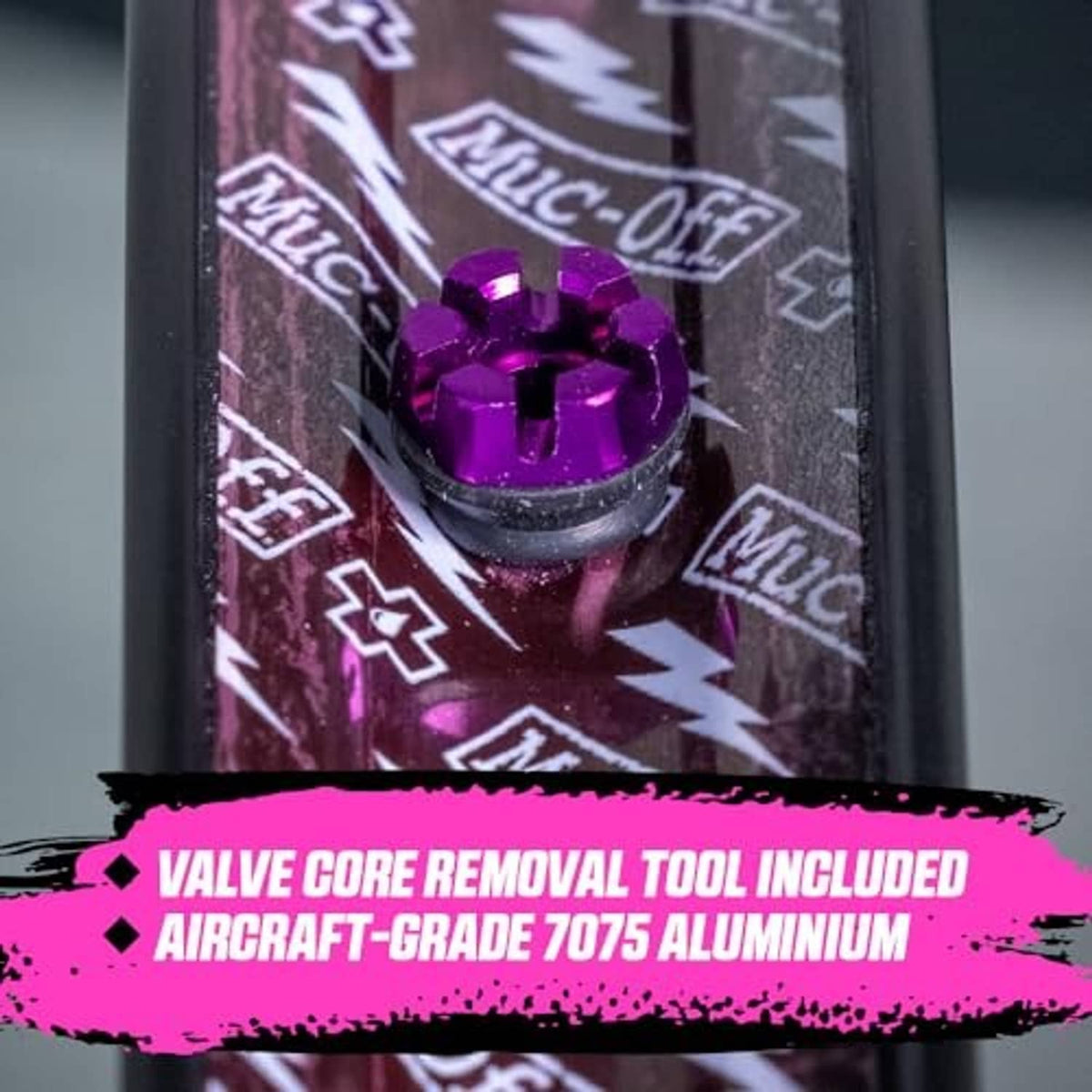 Purple Presta tubeless valve core removal tool included with valve base