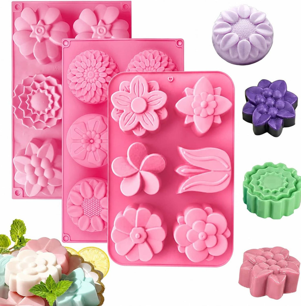 Silicone soap mold tray with flower-shaped cavities in pink, purple, and green