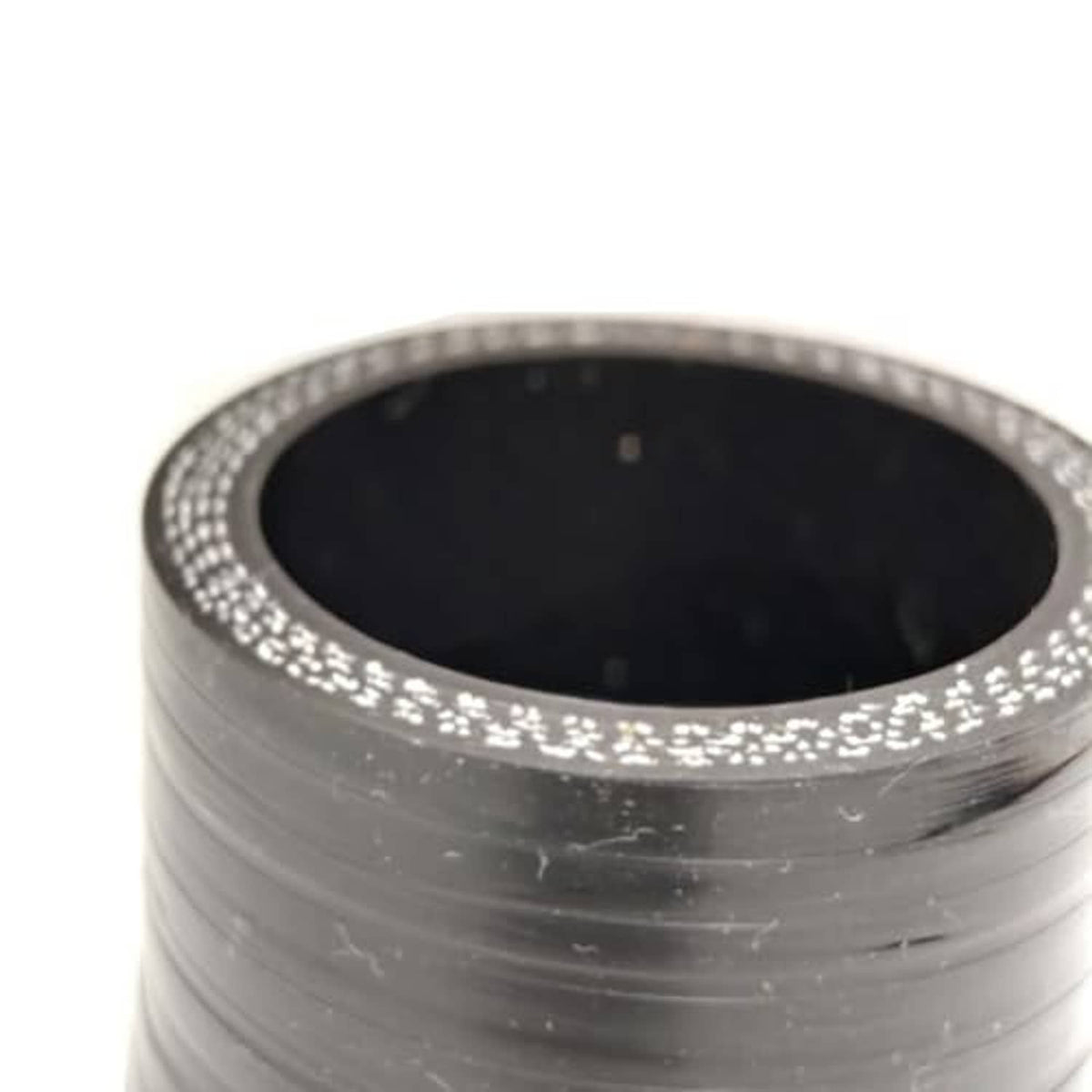Black rubber reducer coupler with reinforced rim and visible interior bore