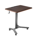 Dark wood standing desk with metal lift legs and rolling caster base