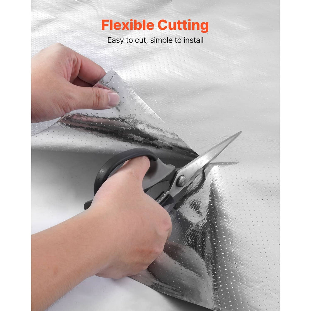 Scissor-cut reflective radiant barrier insulation roll, perforated foil visible