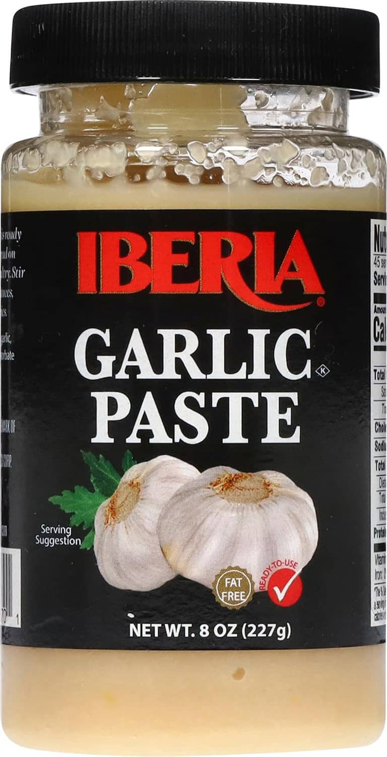 Garlic paste jar front label showing IBERIA brand and garlic clove illustration.