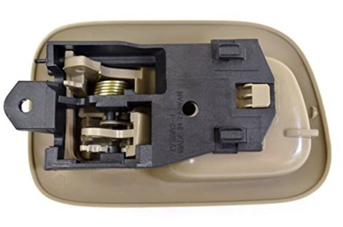 Beige interior door handle trim with exposed latch mechanism and mounting holes