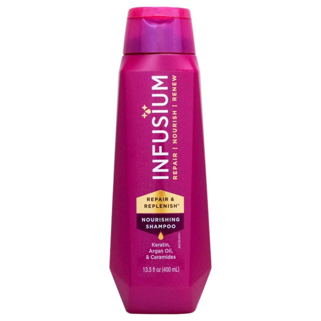 Pink nourishing shampoo bottle with flip-top cap, front label visible