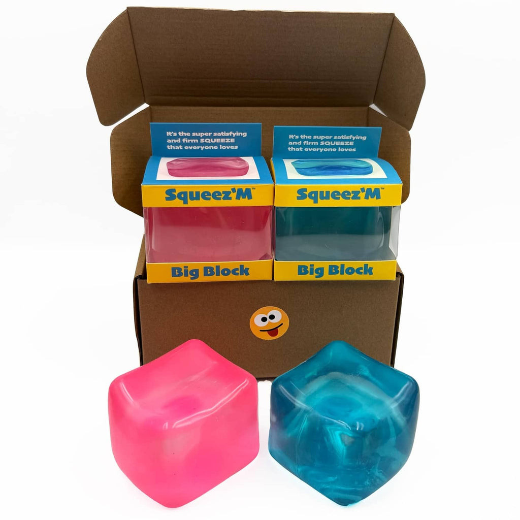 Pack of 2 large stress cubes in pink and blue, shown out of the box