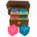 Pack of 2 large stress cubes in pink and blue, shown out of the box