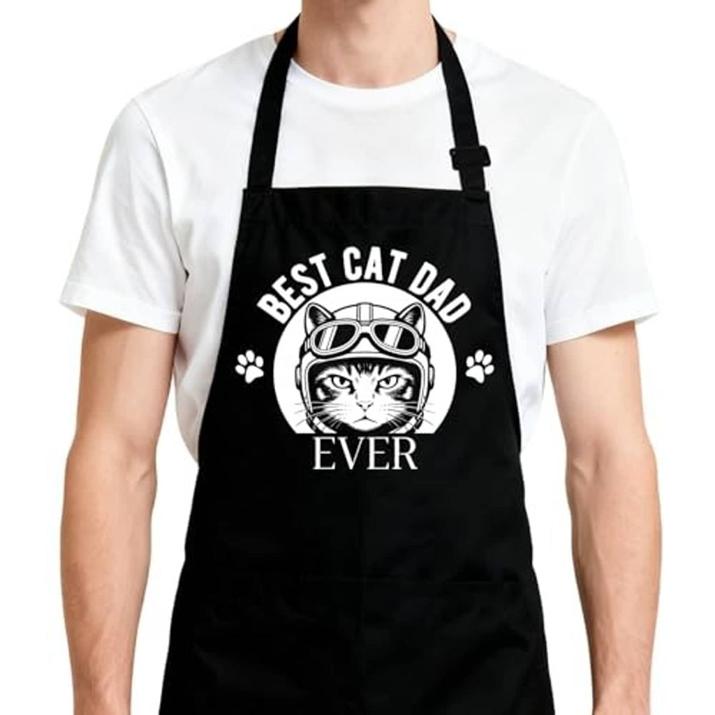 Black kitchen apron front with 'Best Cat Dad Ever' cat design and neck strap.