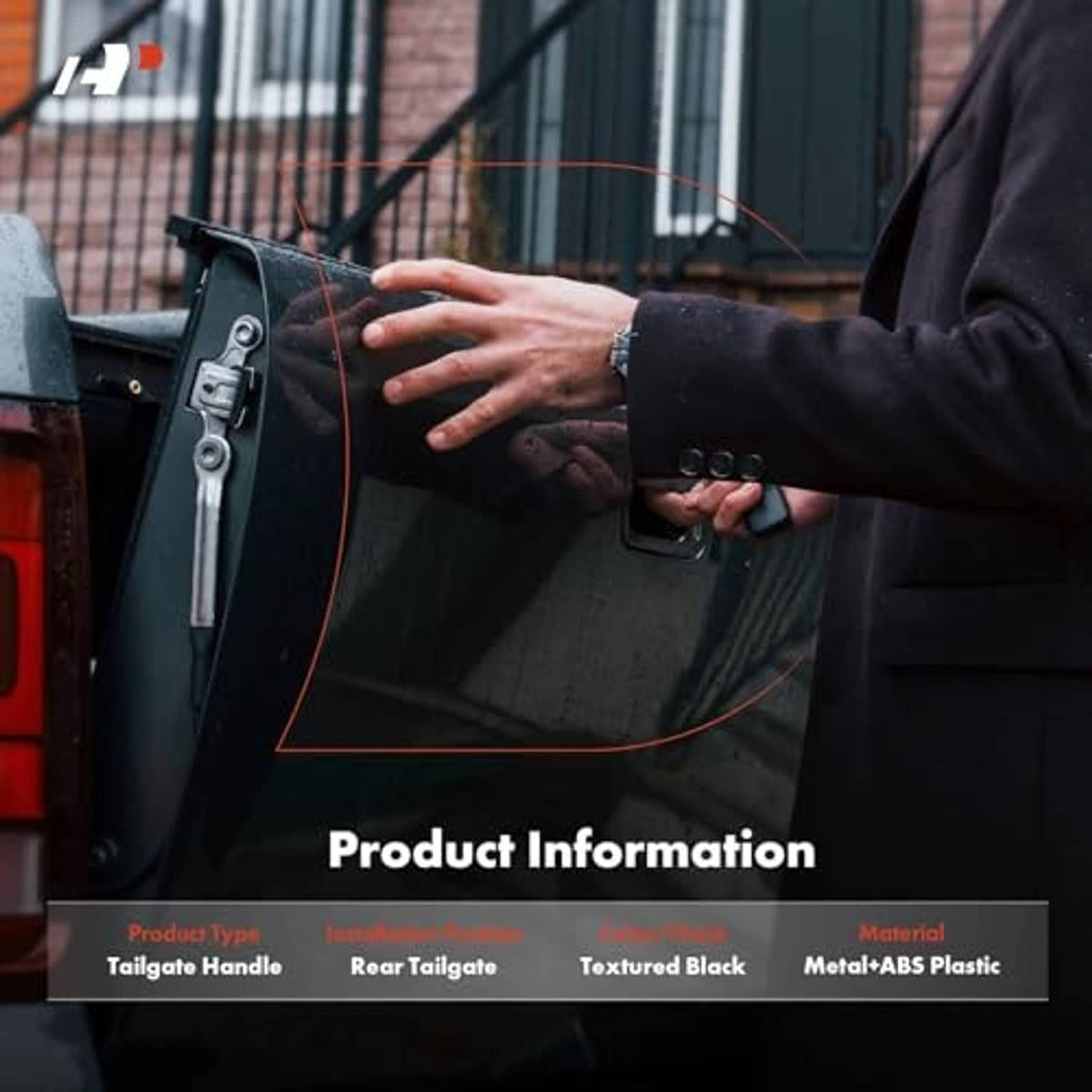 Textured black tailgate handle on vehicle rear door, matte bezel finish
