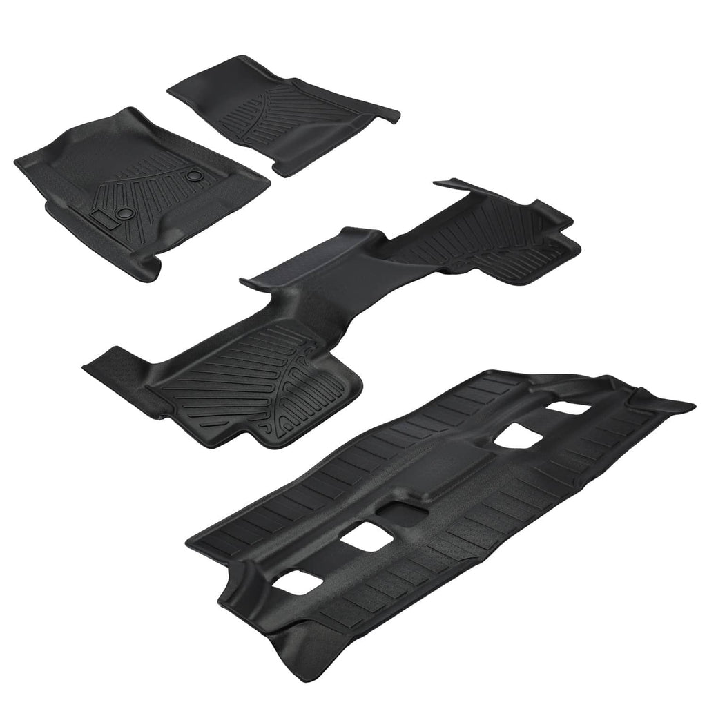 Black TPE all-weather floor mats set with molded grip patterns and openings