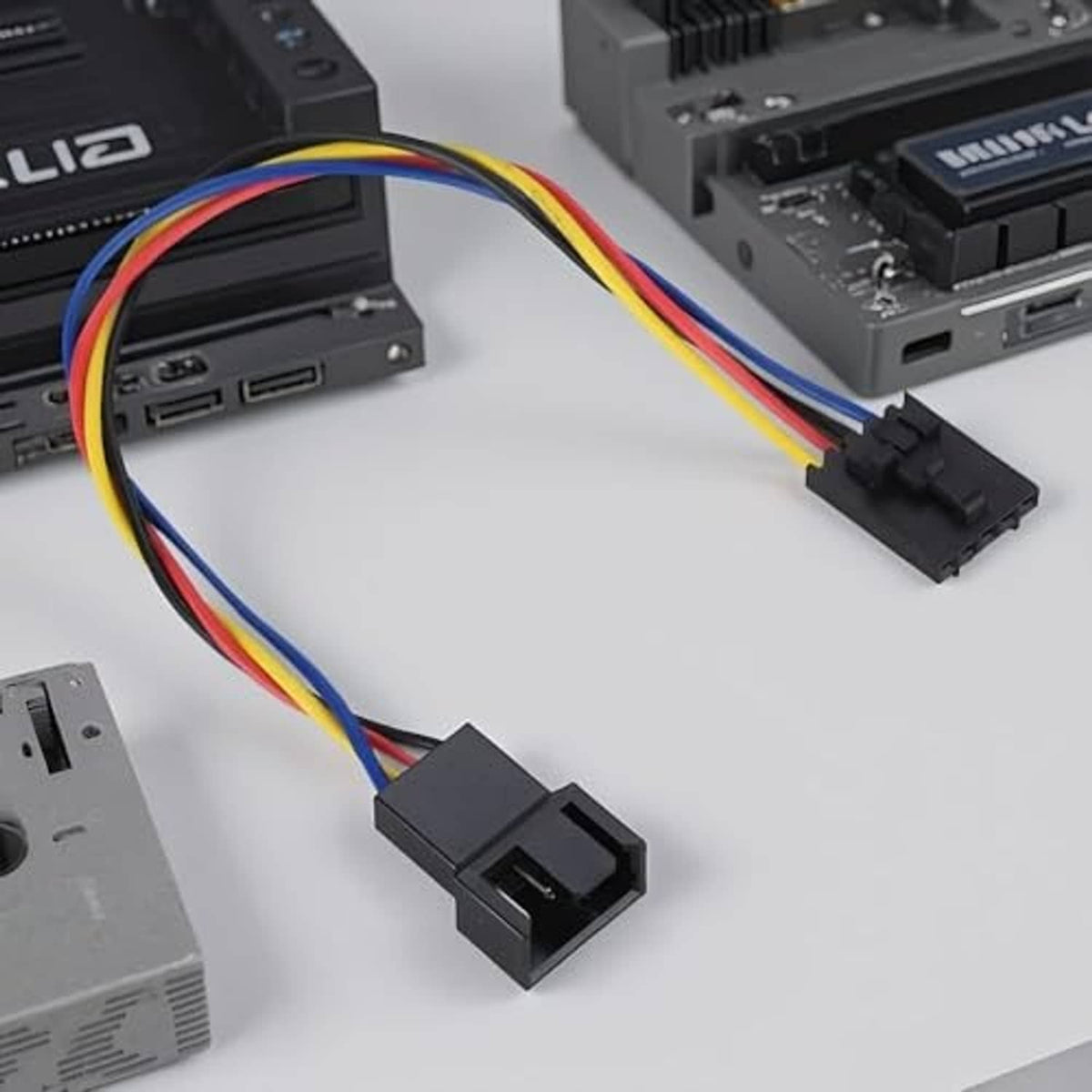 CPU fan conversion adapter cable with multicolor wires and black 5-pin and 4-pin plugs