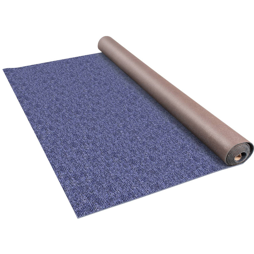Blue marine carpet rug rolled on itself, dense cut-pile texture with brown backing