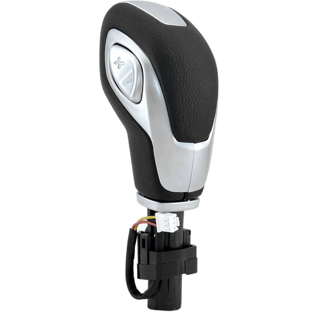 Automatic transmission shift knob with black leather-texture grip and silver control panel