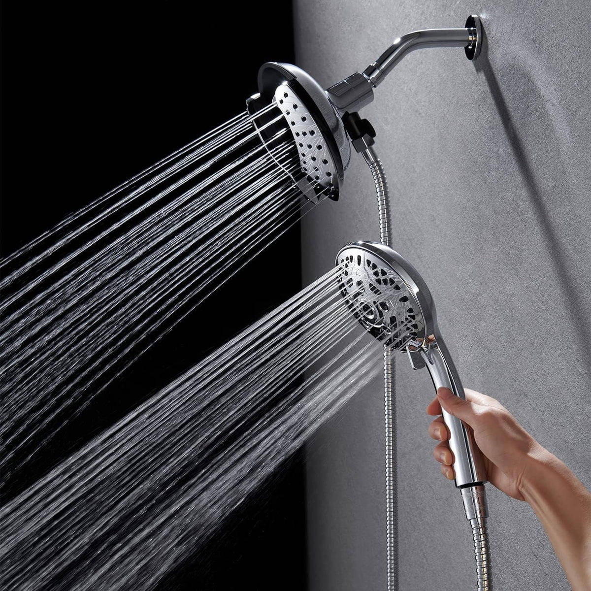 Chrome handheld shower sprayer with round nozzle face and flexible hose