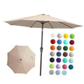 Beige 9 ft patio umbrella with open canopy and straight center pole